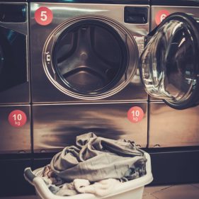 laundry-machines-at-laundromat-shop-2021-08-26-16-21-12-utc-min